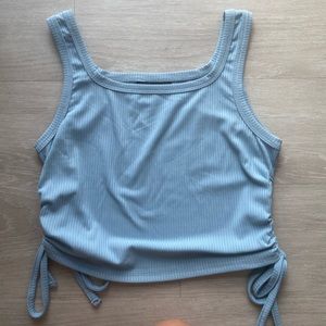 Light blue ribbed tie side tank
